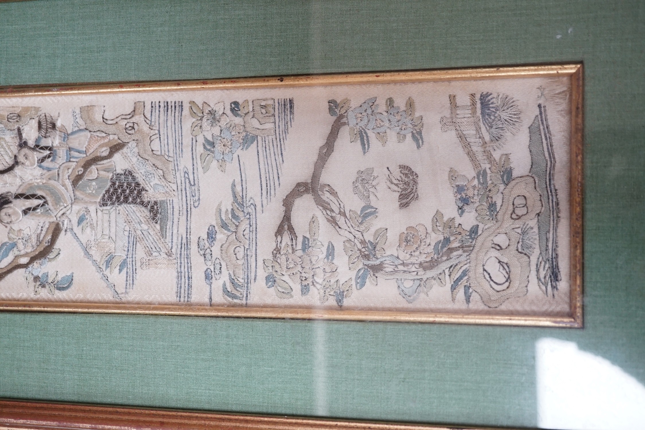 Three pairs of gilt framed, 19th century, silk embroidered, sleeve bands (for Chinese robes), 49cms long x 9cms wide (not including mount or frame)